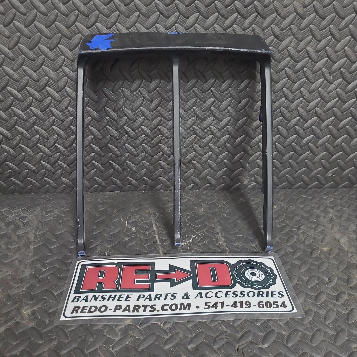 OEM Radiator Cover Blue Painted Black *USED*