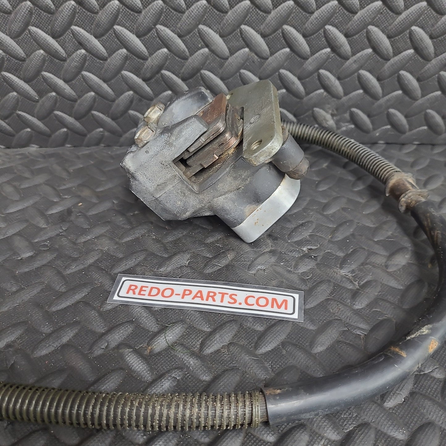OEM Rear Brake Caliper w/ Block Off and Hose *USED*