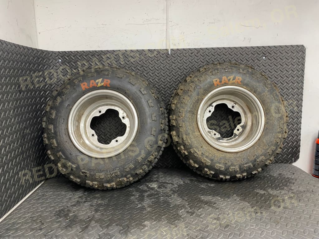 21x7-10 Maxxis Razr Front Tire on OEM Wheel *USED* Parts - Used