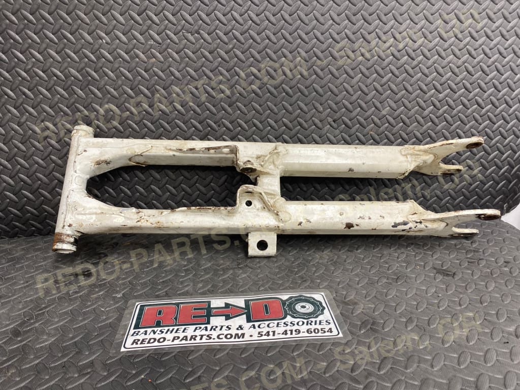 Modified OEM Swingarm + 8 Factory Style Carrier White *USED* Parts - Used