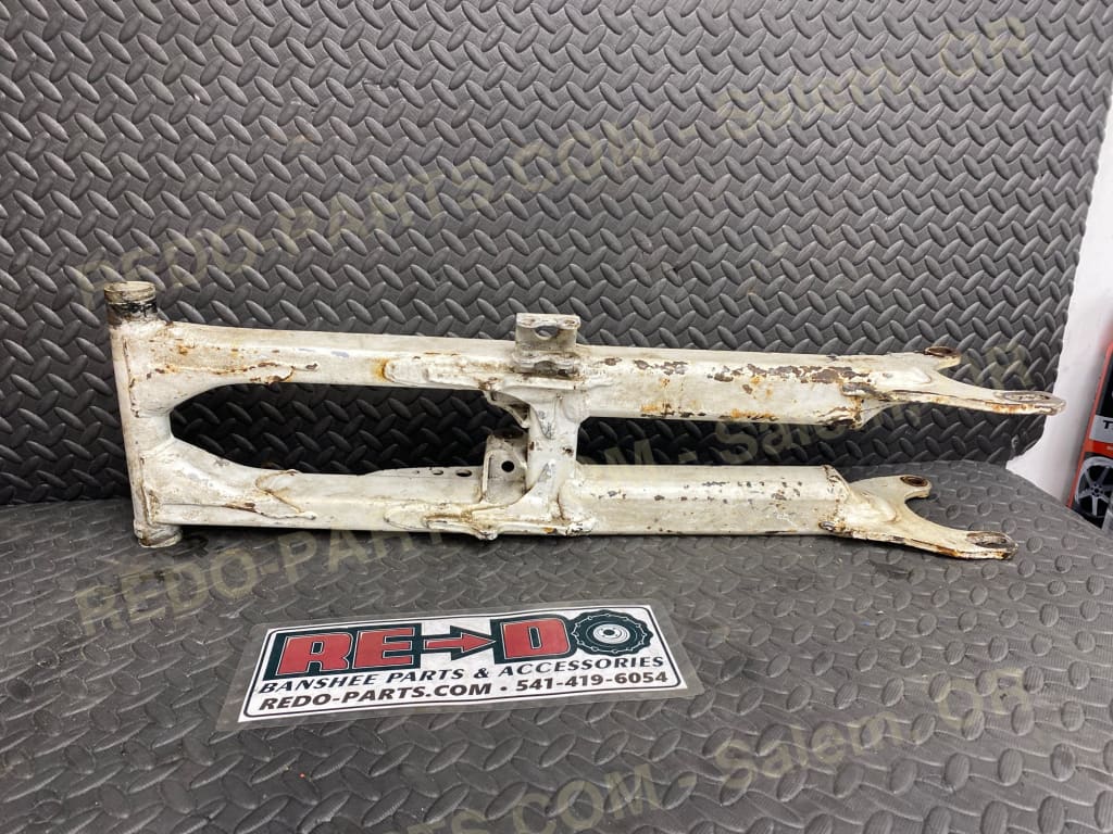 Modified OEM Swingarm + 8 Factory Style Carrier White *USED* Parts - Used