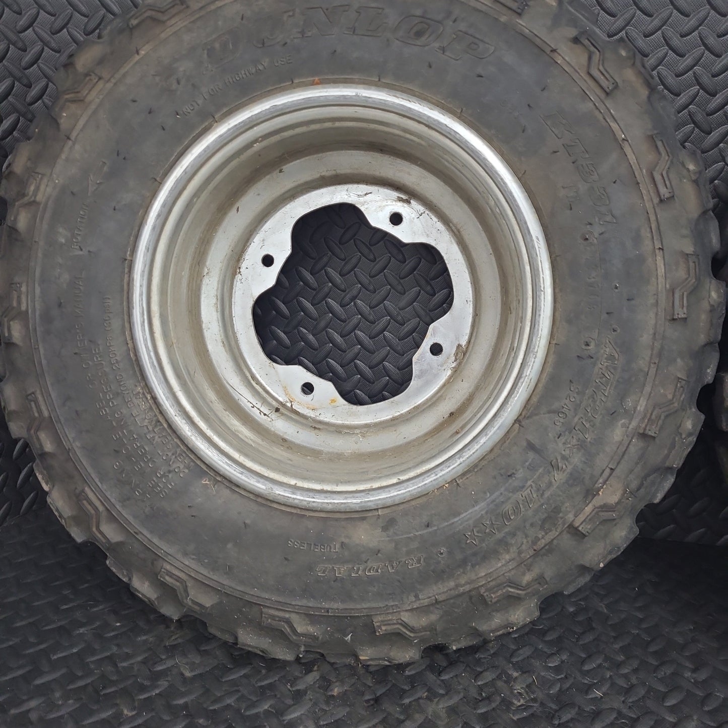 21x7-10 Front Tires on OEM Wheels Set of 2 *USED*