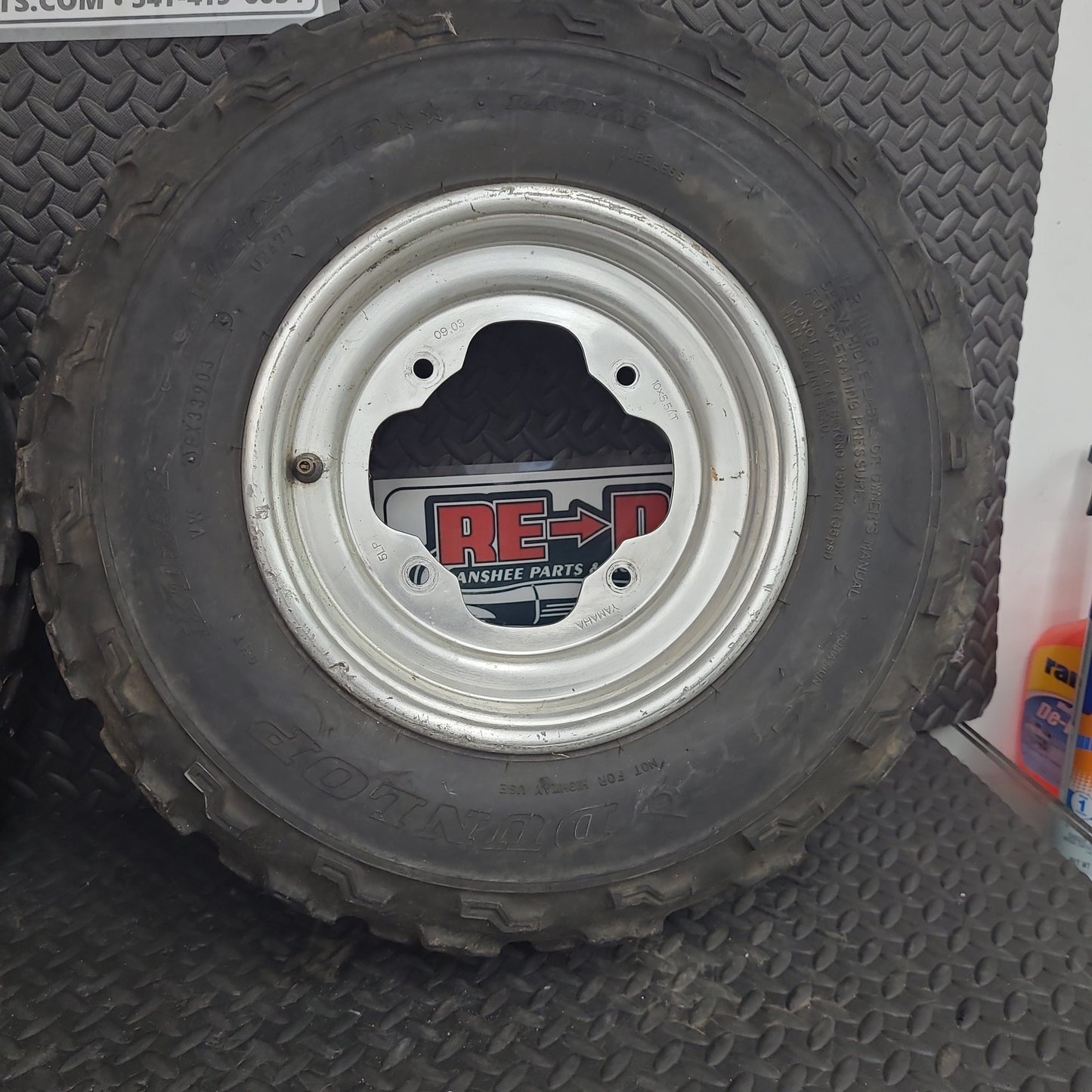21x7-10 Front Tires on OEM Wheels Set of 2 *USED*