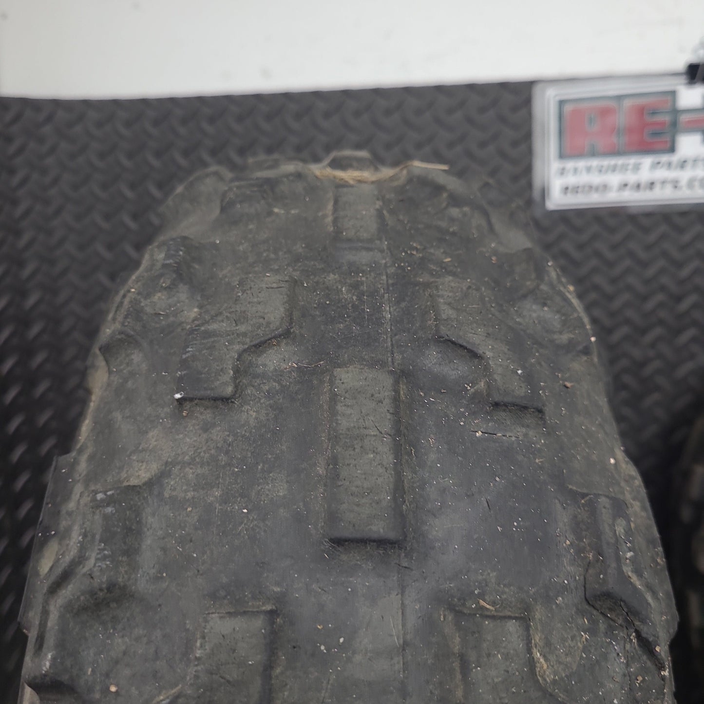 21x7-10 Front Tires on OEM Wheels Set of 2 *USED*