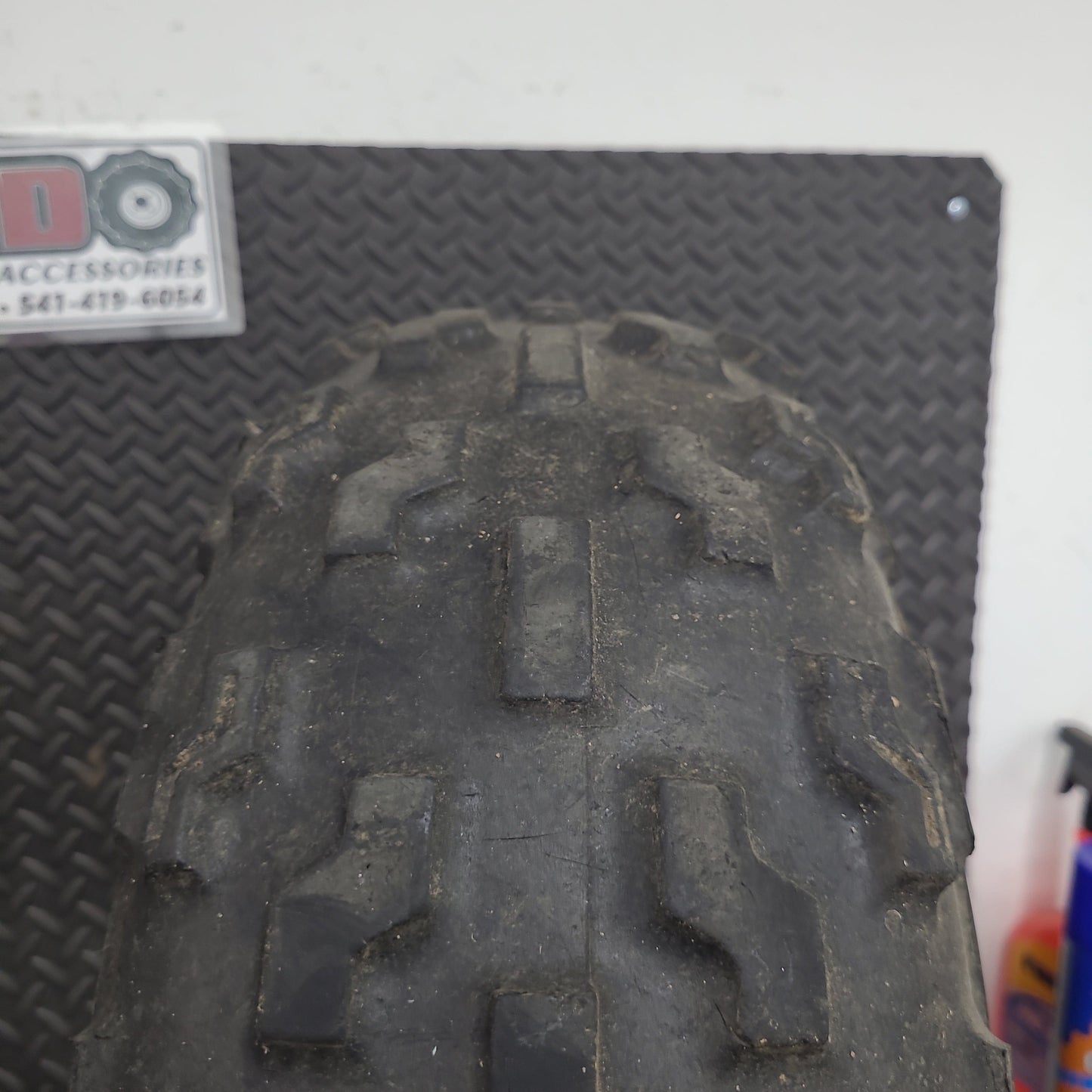 21x7-10 Front Tires on OEM Wheels Set of 2 *USED*