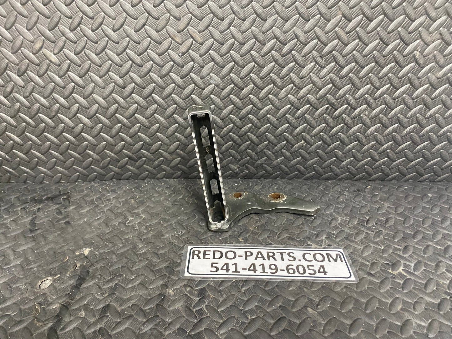 Factory OEM Foot Peg. Right Side (kicker side) *USED*