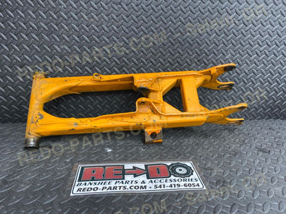 Modified OEM Swingarm + 4 Factory Style Carrier Orange *USED* Parts - Used