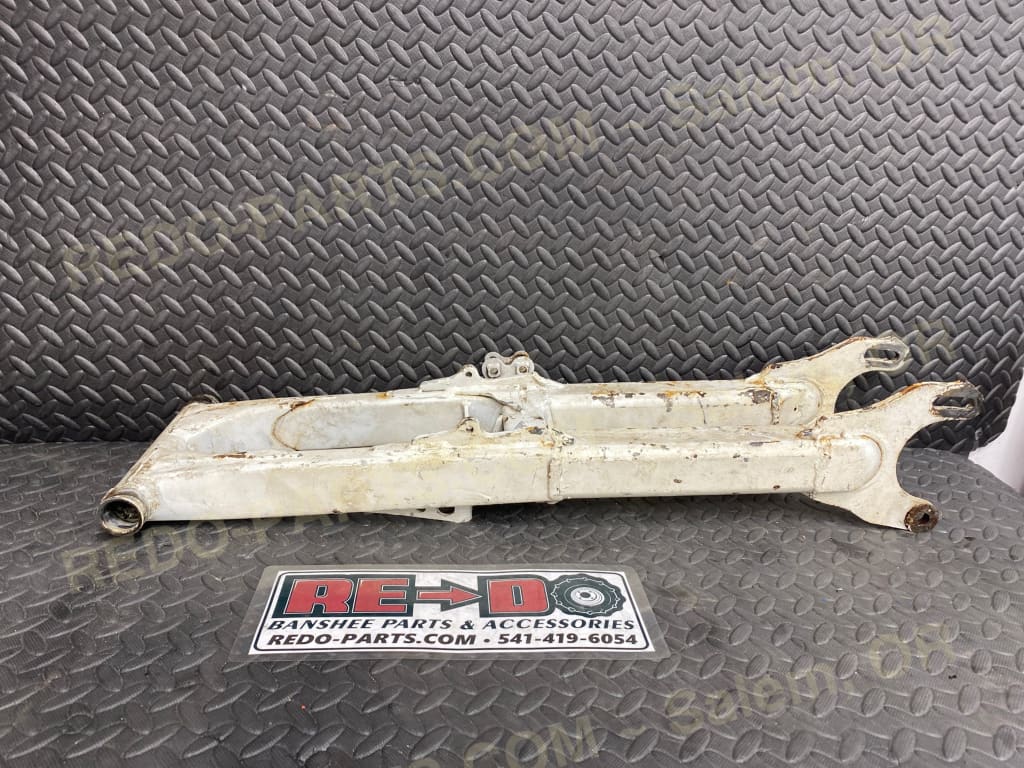 Modified OEM Swingarm + 8 Factory Style Carrier White *USED* Parts - Used