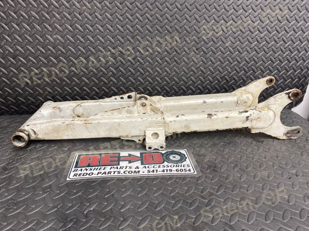 Modified OEM Swingarm + 8 Factory Style Carrier White *USED* Parts - Used
