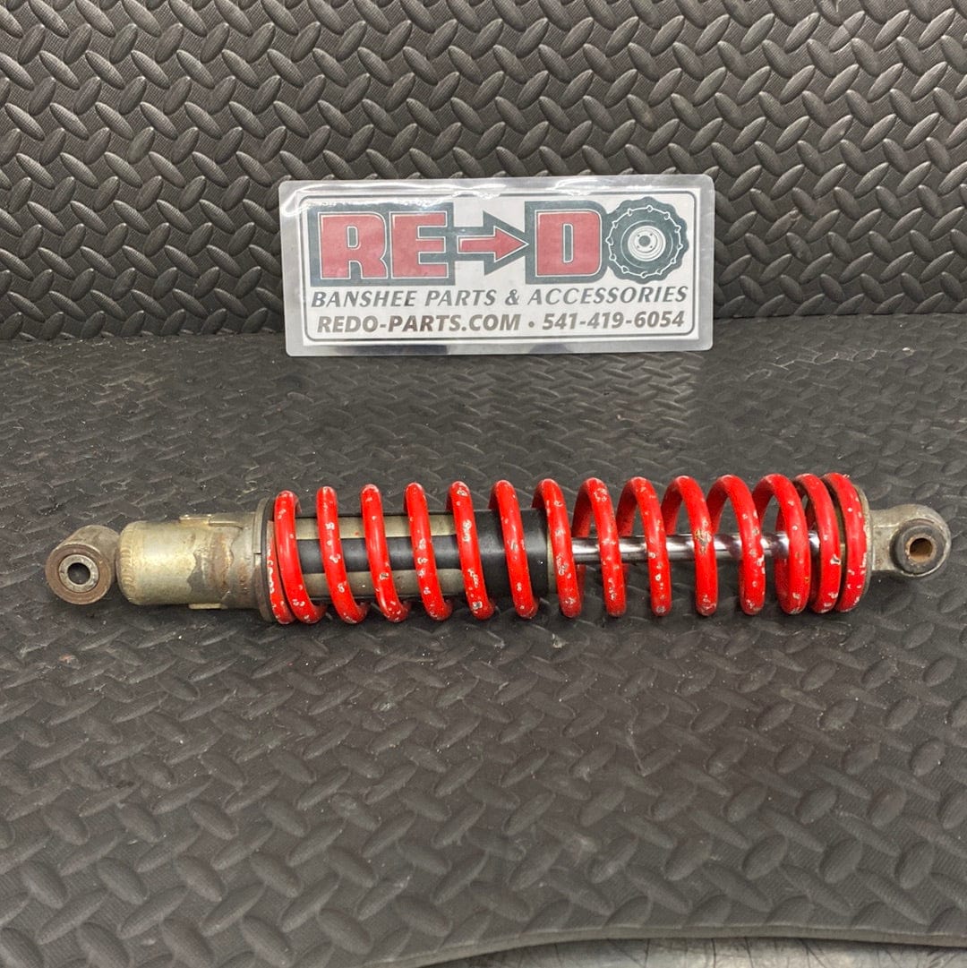 Red Front Shock with Chipped Paint
